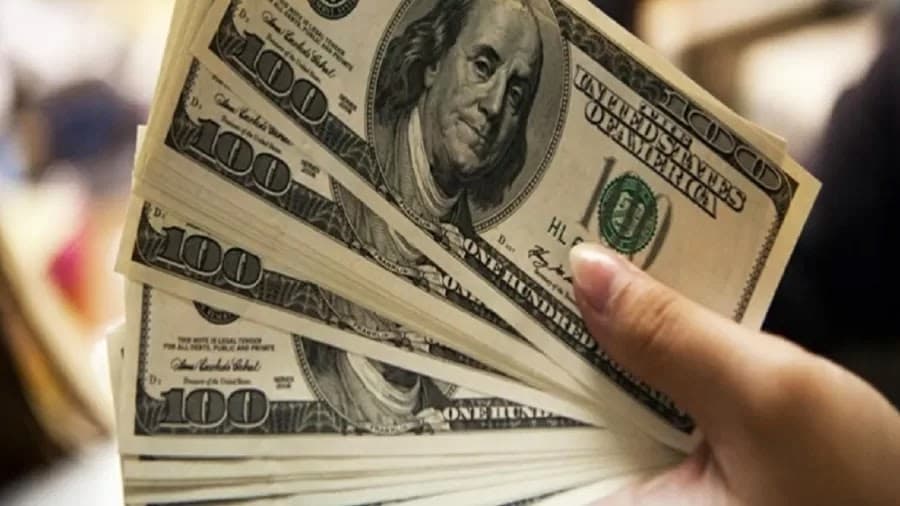 Dólar opera em queda, vendido perto de R$ 5,15