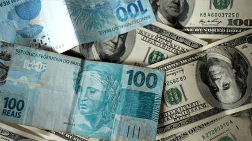 Dólar fica estável e fecha em R$ 5,80 à espera por pacote de cortes