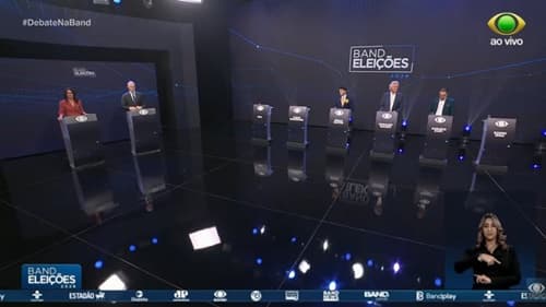 Ausência de Lula e Flávio Bolsonaro em debate gera críticas de adversários