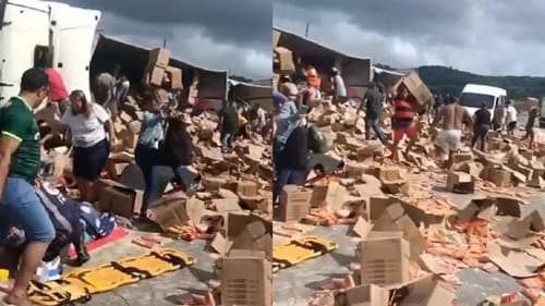 População saqueia carga de biscoito enquanto SAMU socorre motorista ferido em acidente